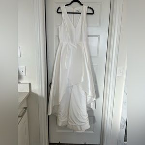 White Calvin Klein dress with high low hem